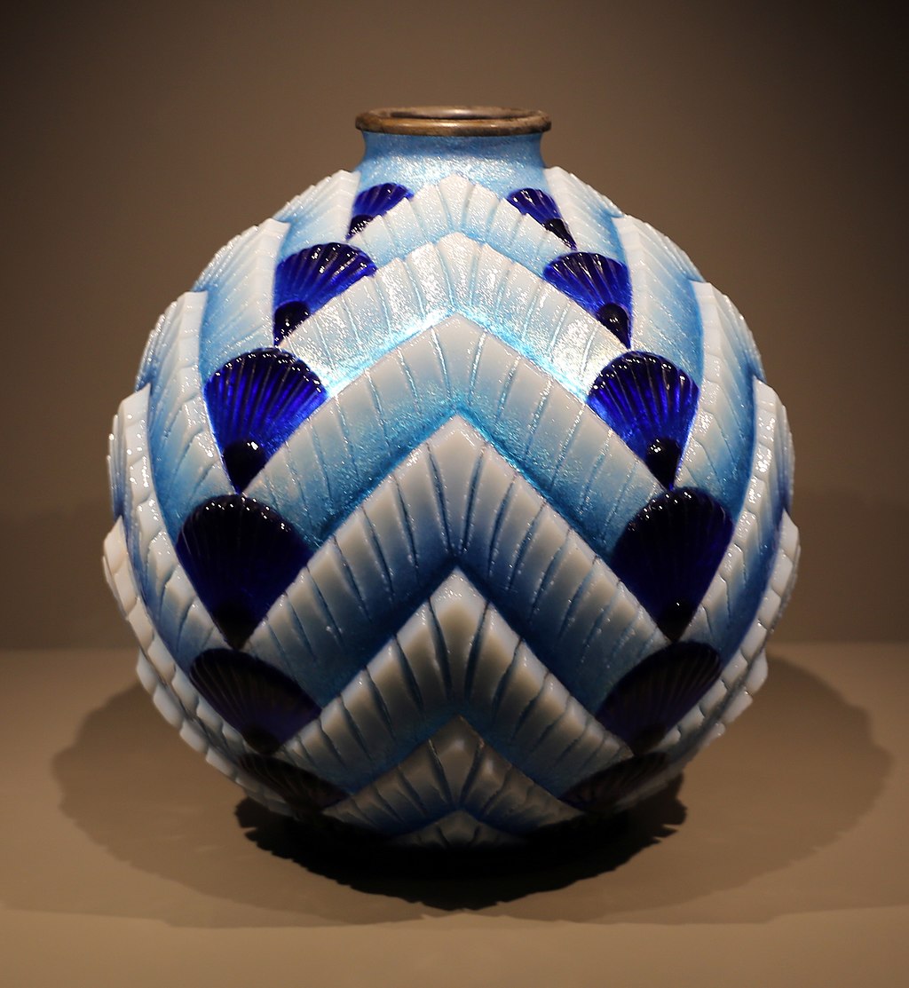 An Art Deco vase showcases glasswork and pattern that influences House of Pixen Christmas ornament design.